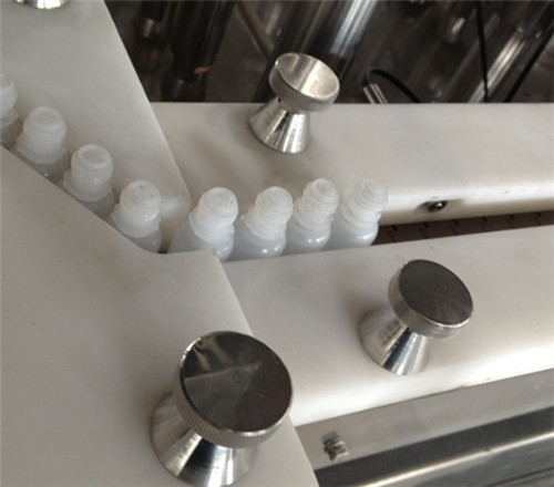 pajisje shishe shtrëngimi